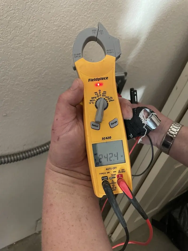 Voltage testing with clamp meter during Generator Installation in Hamden